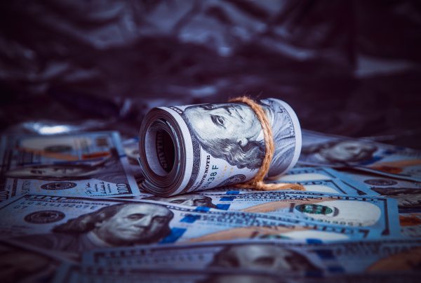 Money in dark shadows