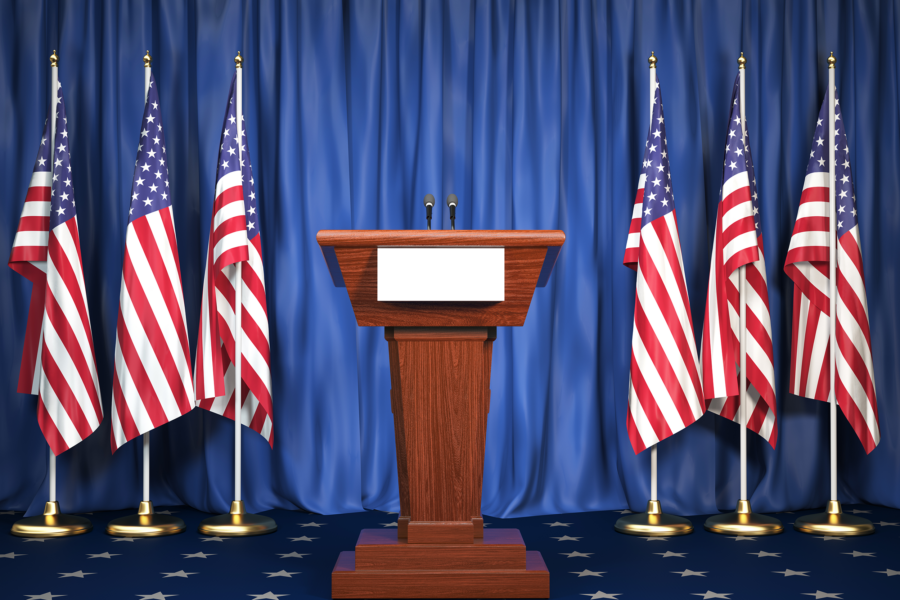 Podium surrounded by American flags
